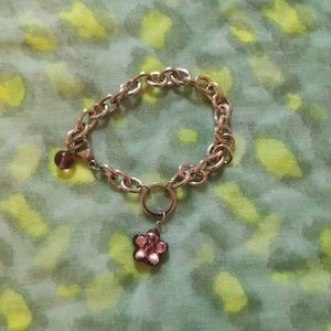 Chain bracelet with purple flower charm